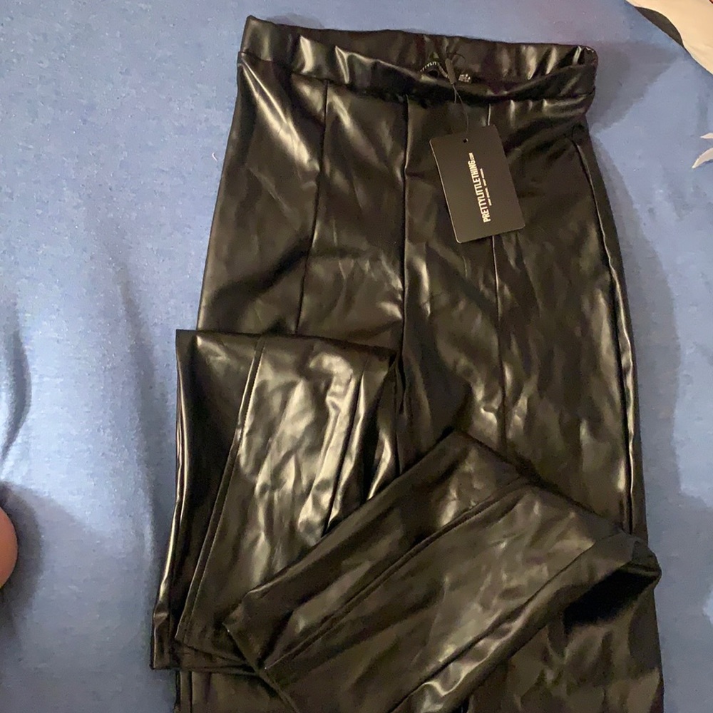 Black faux leather seam split trousers